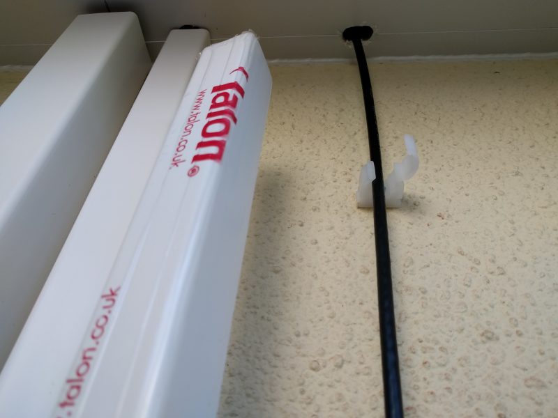 Coaxial cable on house exterior